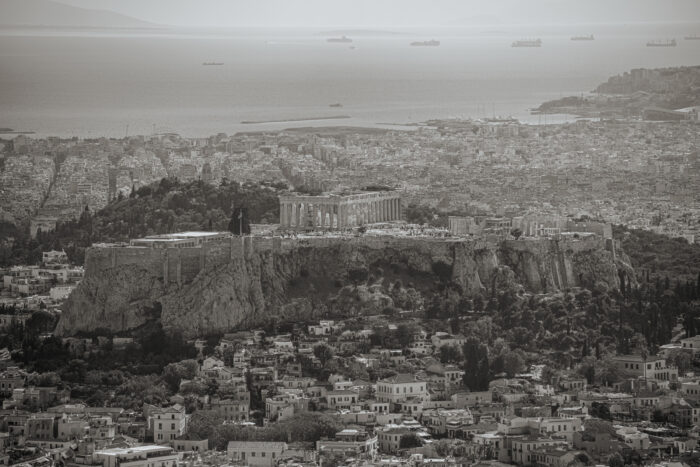 The Acropolis above Athens, with the sea and ships in the distance, 2024