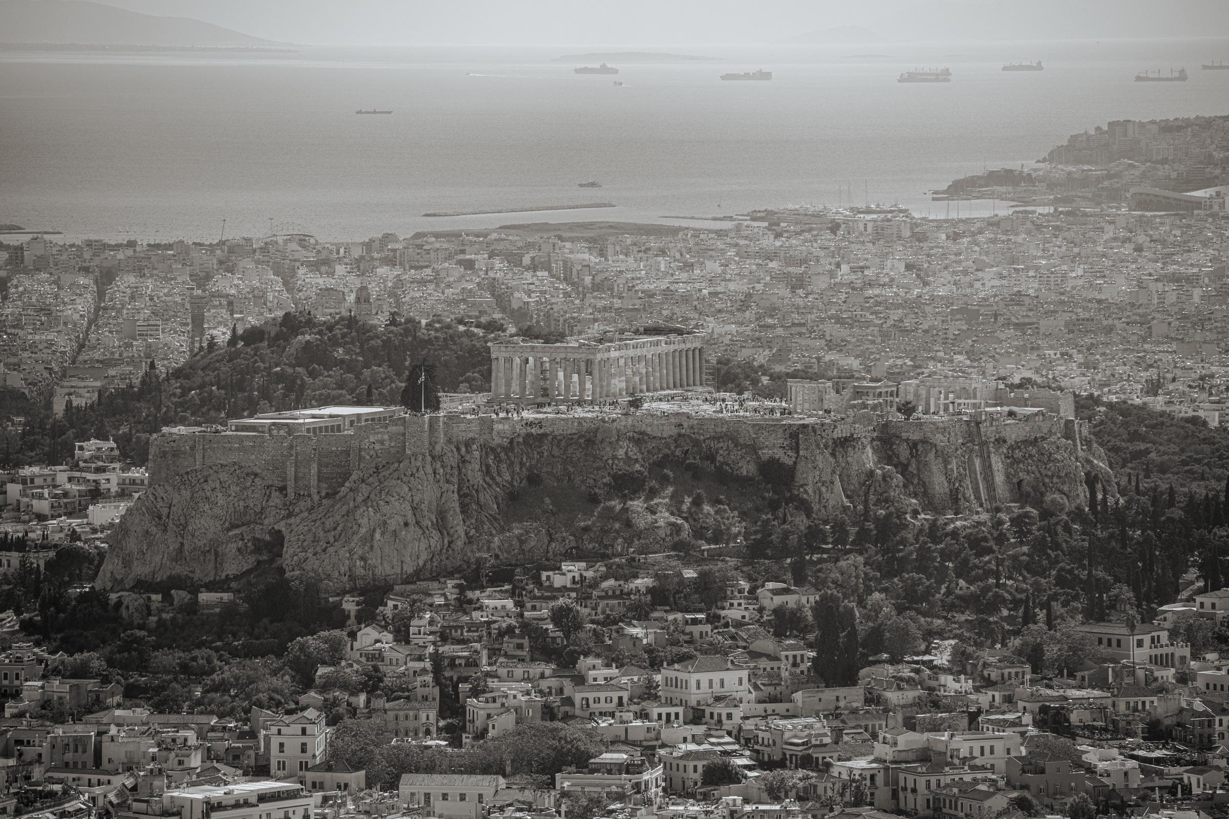 The Acropolis above Athens, with the sea and ships in the distance, 2024